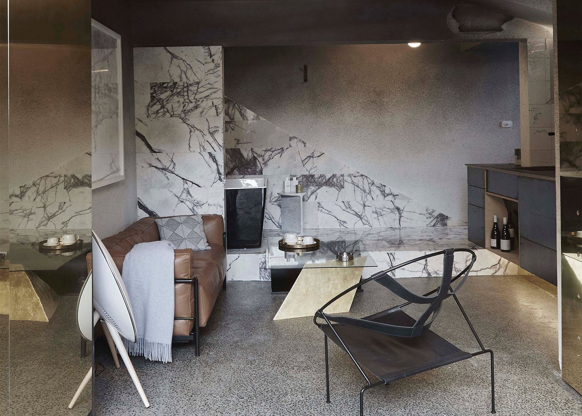 Guests buy furniture inside Microluxe flat by <a href="/edwardsmoore/">Edwards Moore</a> kcy.me/2dgs0  vía @Dezeen #Architecture