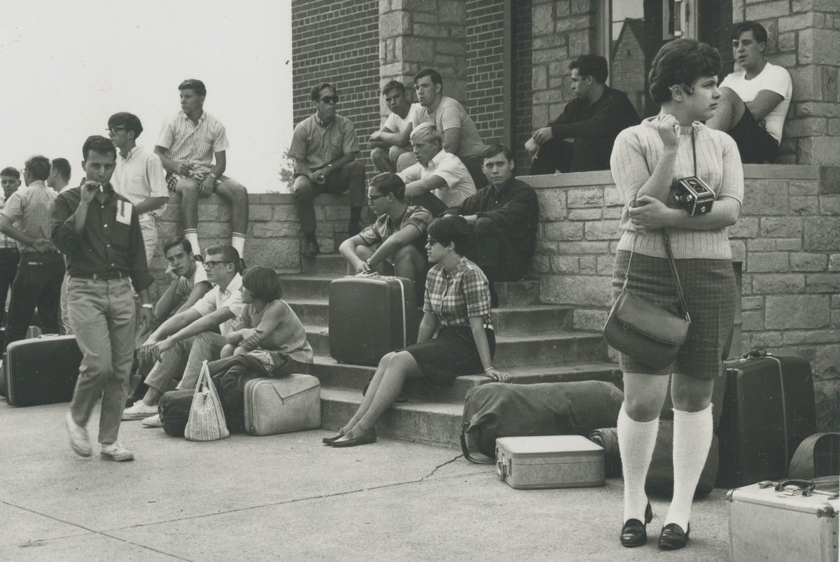 Students wait for the <a href="/UToledo/">The University of Toledo</a> Freshman Camp bus, 1963. The camp was held at the YMCA Storer Camp in Michigan #TBT