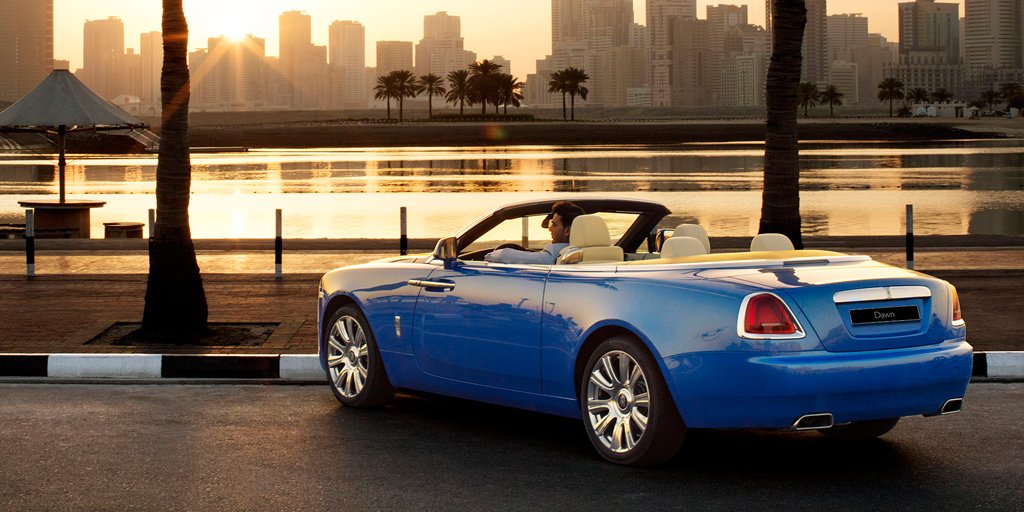Transformed by the touch of sunlight. Discover #RollsRoyceDawn in Arabian Blue: bit.ly/29v6QpV