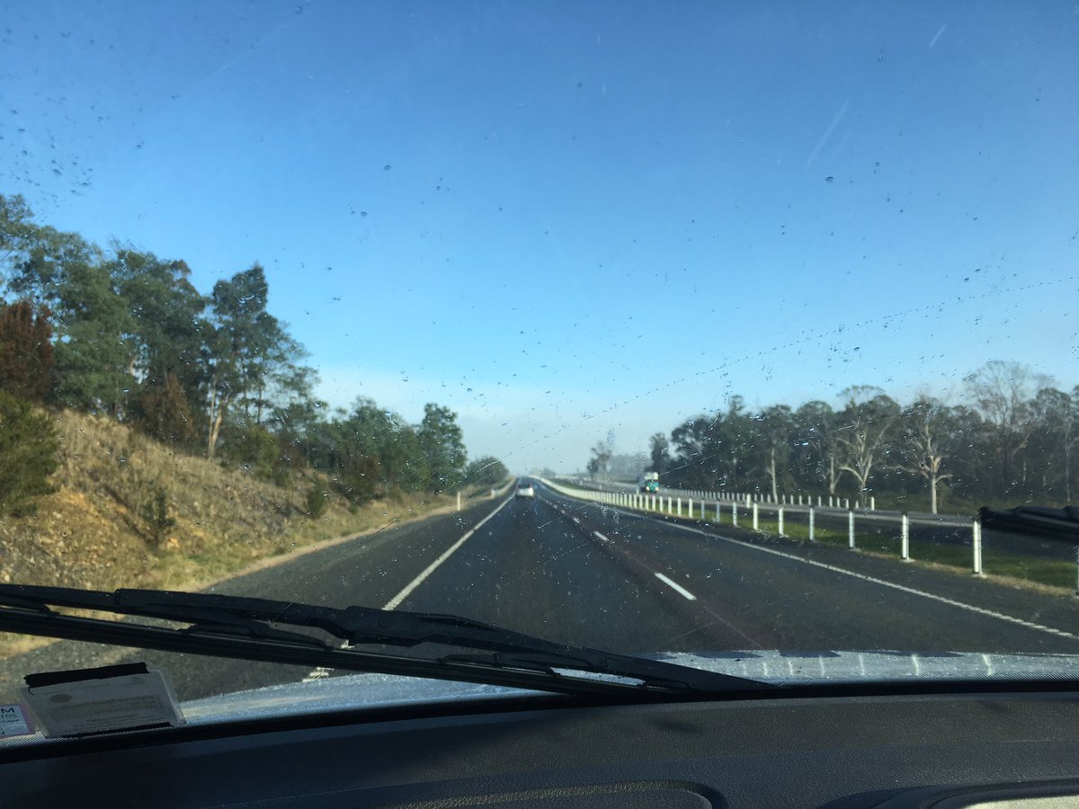 ben_hansen's tweet photo. It's snowing on the Bass Hwy near Westbury. Drive carefully out there. #MonsterLow @WINNews_Tas https://t.co/X7Q2GLRVtR
