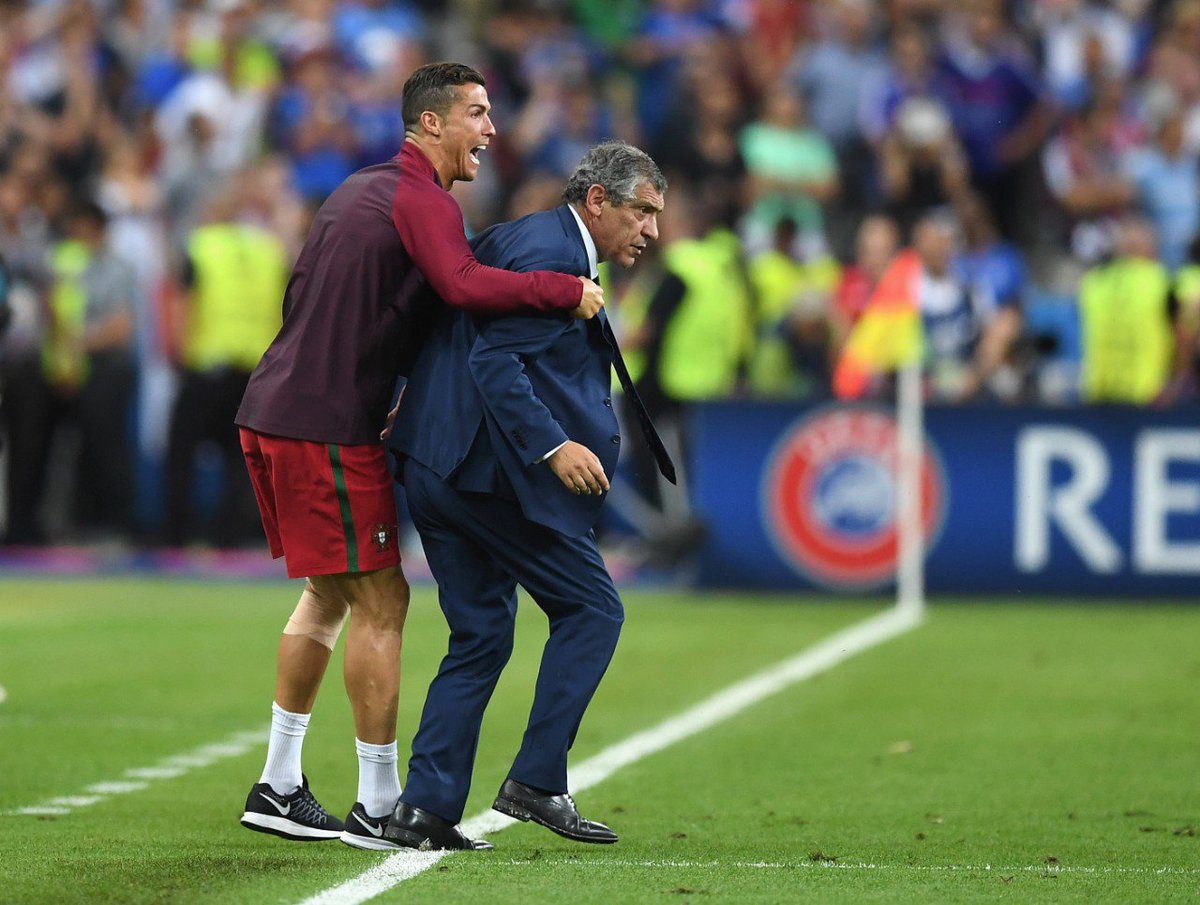 Slate's tweet image. These photos of Cristiano Ronaldo and Fernando Santos are the real Euro 2016 winners: slate.me/29OLLt9