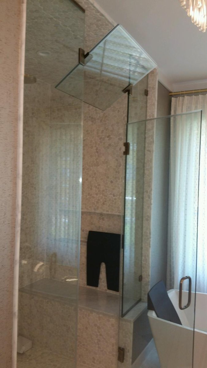 BTglass1960's tweet photo. Custom Steam Shower. #brittandtilsonglass #asheville #steamunit #operabletransum #brushedbronze #framelessshower https://t.co/Pxw6HCaVMt