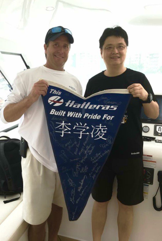 HatterasYachts's tweet photo. The #45Express with the custom orange hull has reached its final destination: China. https://t.co/iK60qbA8se