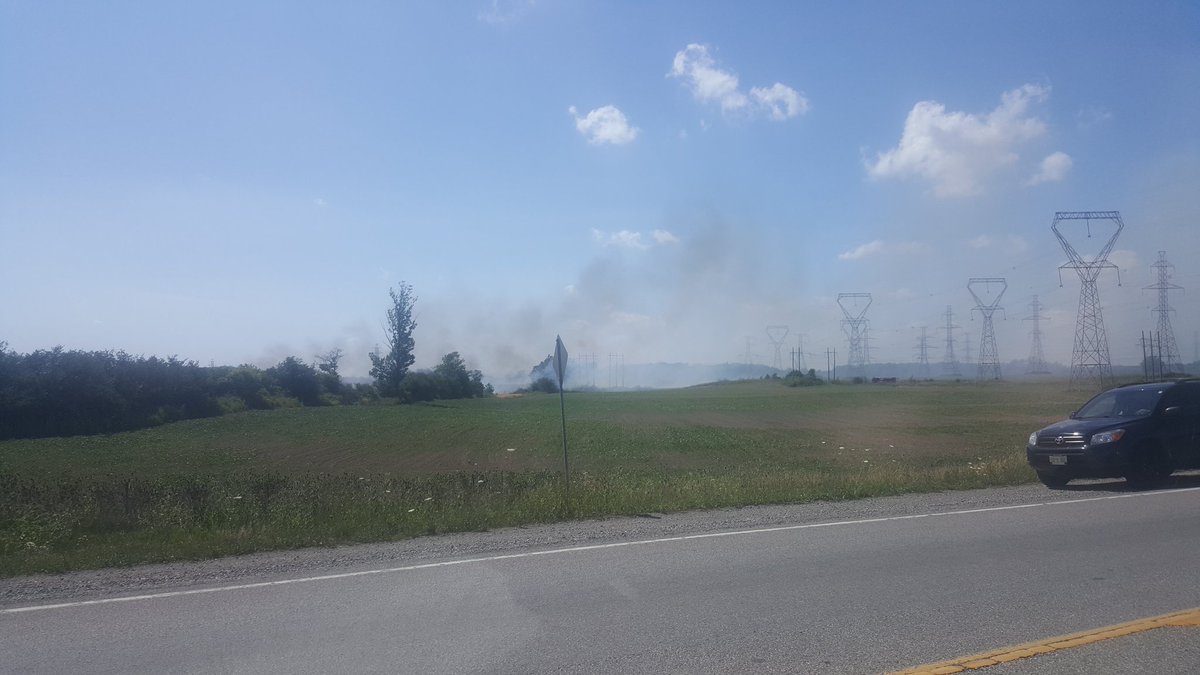 Awiatowski's tweet image. Huge field fire in #caledonia #sixnations area...Hwy 6 firefighters just arriving.