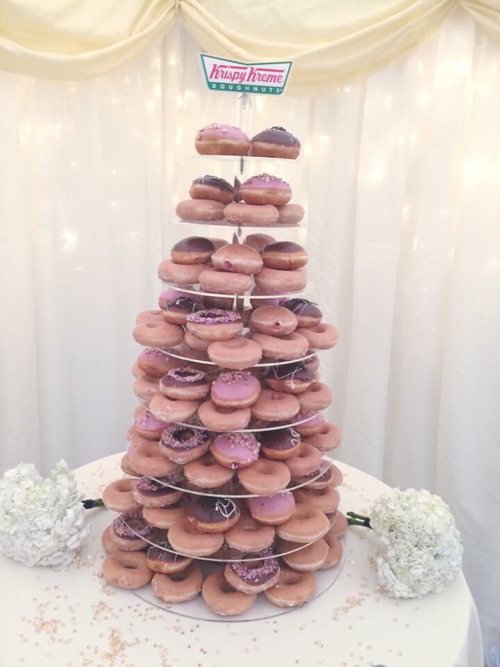 A fun &amp; quirky alternative to a #WeddingCake these #krispykreme #Doughnuts go down a treat at any #Wedding #bride