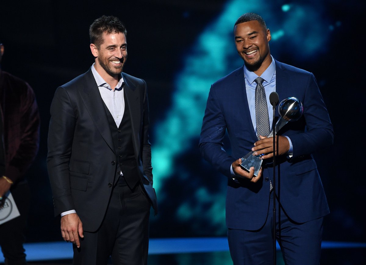 ESPNNFL's tweet photo. Aaron Rodgers and Richard Rodgers accept the award for Best Play. #ESPYS https://t.co/v9Wfdwjcez