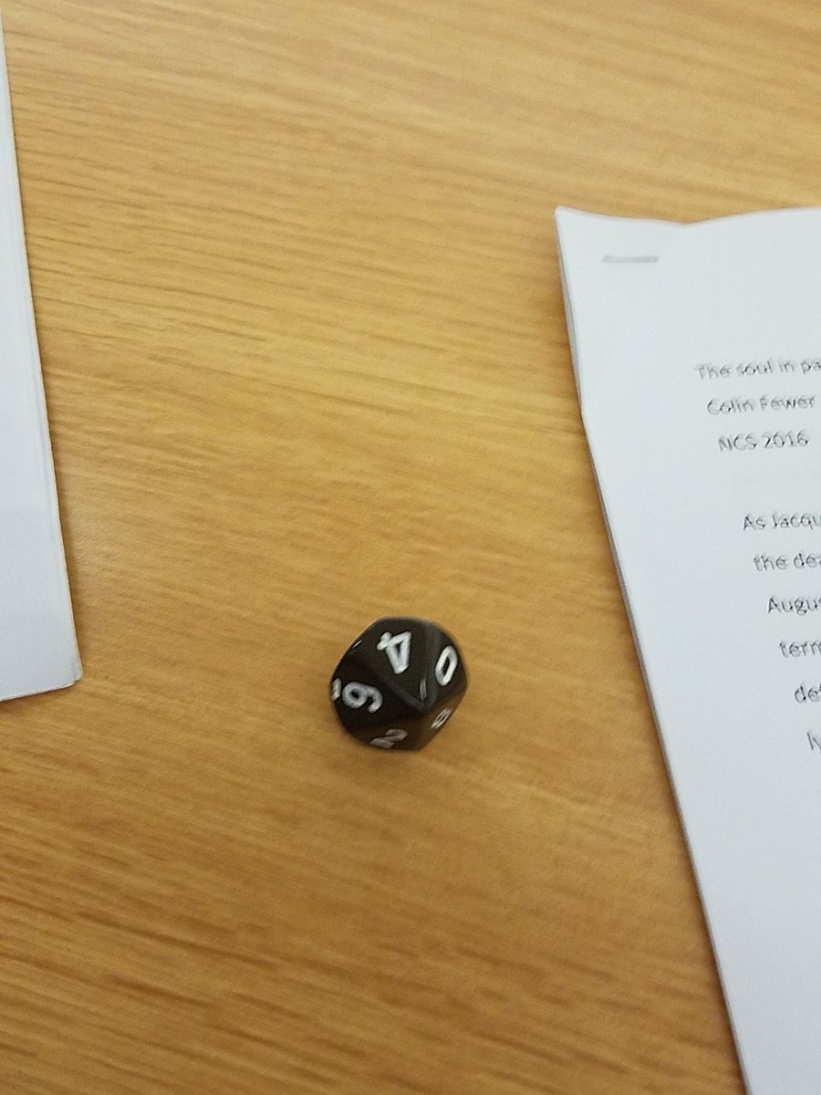 Dan Kline hands out d10 in the teaching roundtable. #NCS16 #10h #GenCon2016