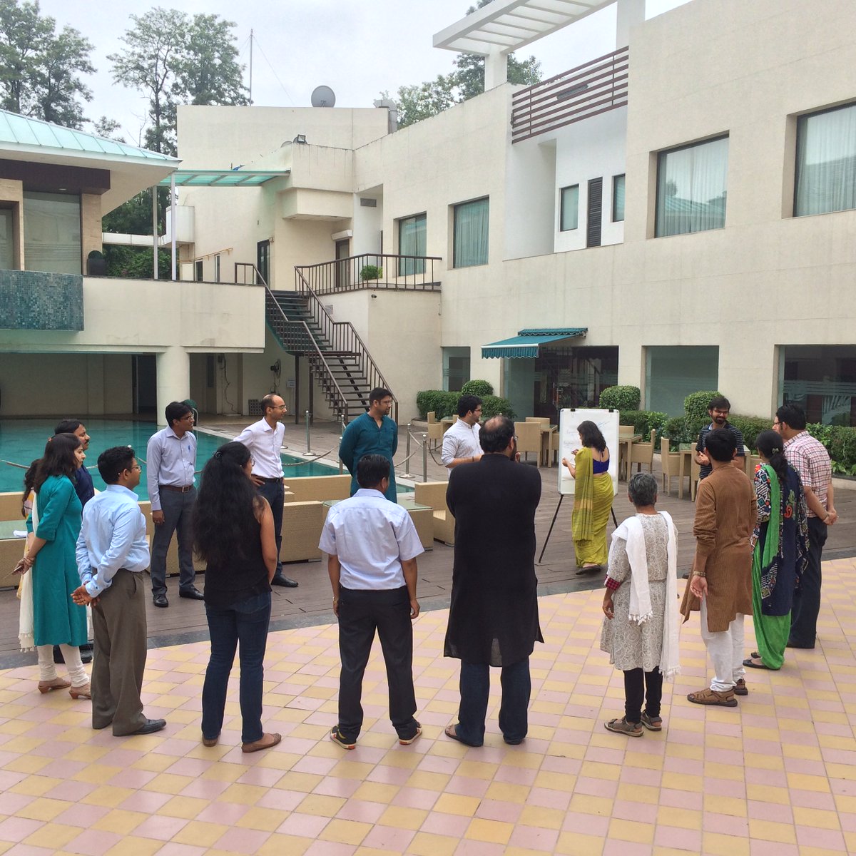 READ_Alliance's tweet photo. Participants discussing their approaches to problem solving.This pool side  exercise was a perfect start to our day https://t.co/GORMHOvwUN