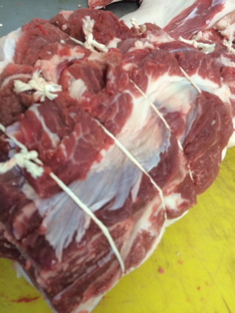TheWholeHoggs's tweet photo. Free range shoulder of pork being tied for @brid_h2g Saturday's market. Deep red no chemicals grass fed no injection https://t.co/YpoDaaYUNO