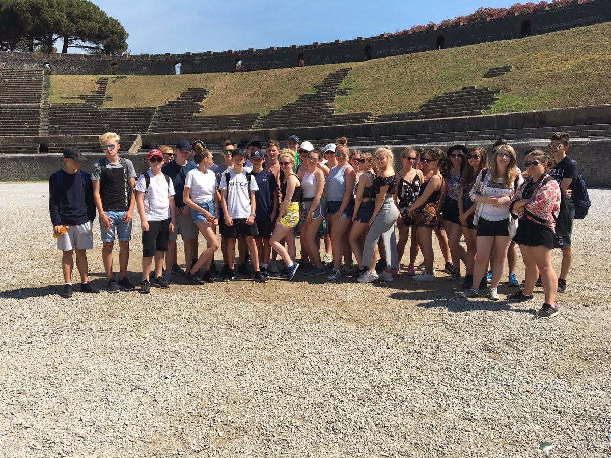 StmarysGEOG's tweet photo. Four very #proud #geoggers. Well done to all on the #Naples2016 tour #AmalfiCoast #Vesuvio #Ravello #Capri #Sorrento https://t.co/VTJJbAhGZs
