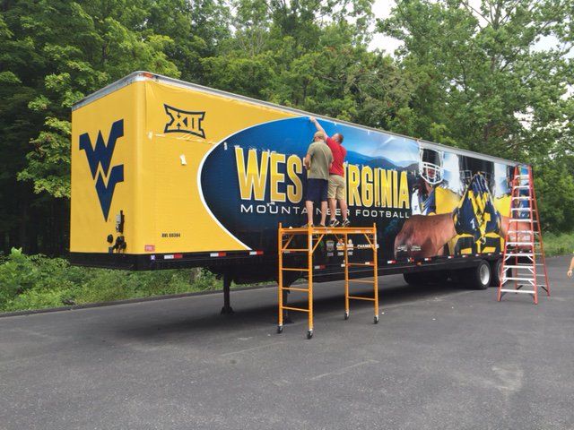 LyonsShane_ATH's tweet photo. Great progress being made on the new wrap for the @WVUfootball equipment truck! @central_allied @MPB_Tweet https://t.co/XA99j4b2K0