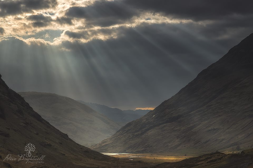 Rays passing through Glencoe, #Highlands.  #ScotSpirit 📷 FB/Dave Brightwell