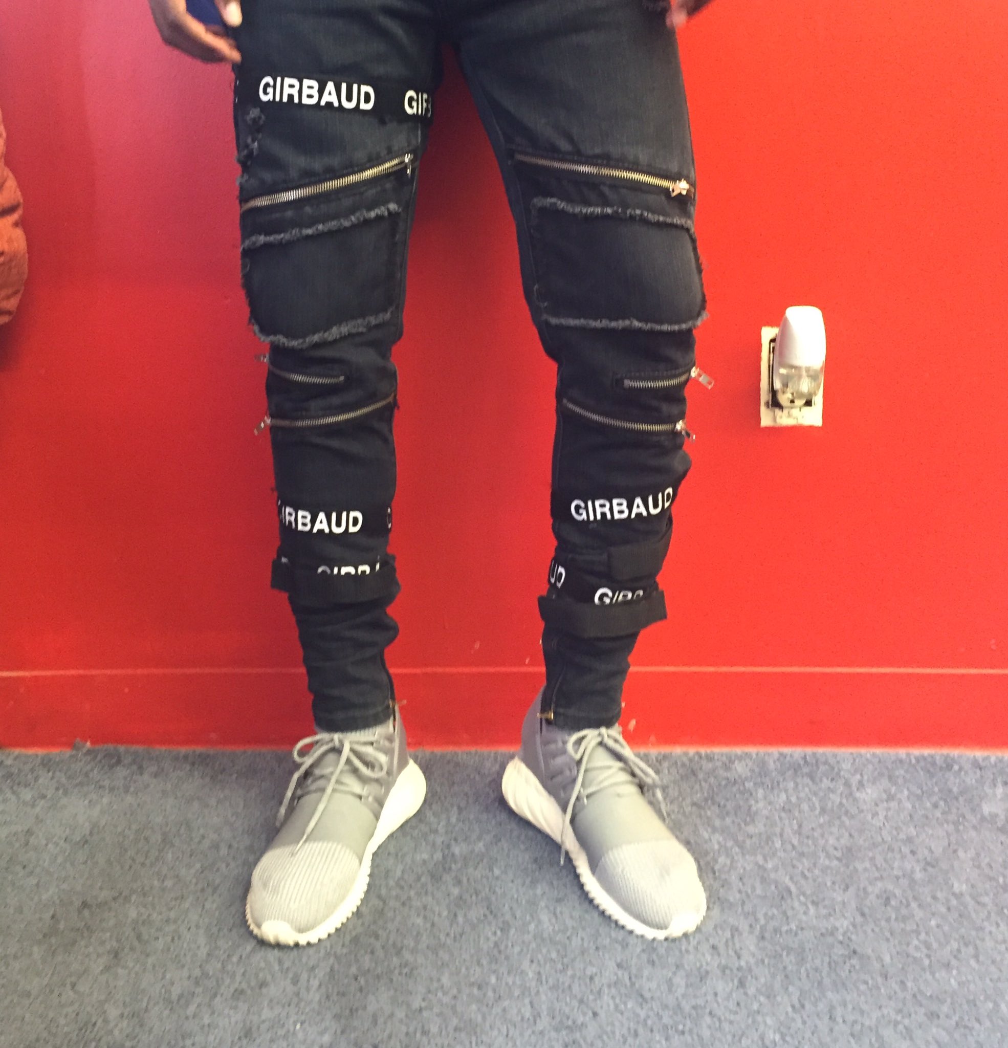 Skinny jeans with Girbaud straps 