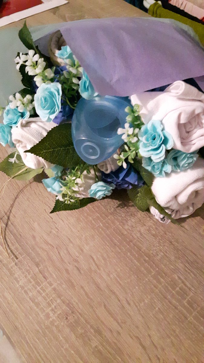 LauriePlevert's tweet photo. Bouquet de naissance  avec vêtements et accessoires bébé https://t.co/PSPuw0YQKc