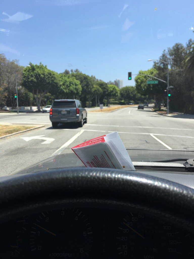 DavidSpade's tweet photo. Got a ticket today and left it on my windshield in protest. I usually leave them for a few days. Take that bev hills https://t.co/MB1jDx88su