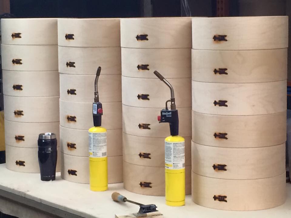 TreeHouseDrums's tweet photo. Ah...The branding iron & a thermos of coffee are the perfect tools when you gotta make 24 snare drums. #compactkit https://t.co/8drI3qyUln