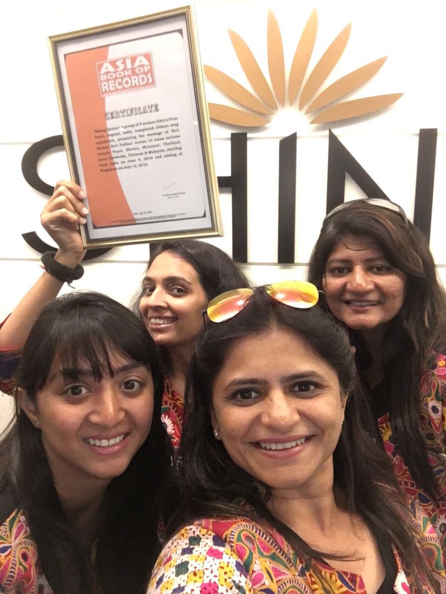BikingSurat's tweet photo. Got Certificate of being "First Female Bikers to Cover 10 Countries" by Asia Book of Records at #Singapore https://t.co/BzLGIuuUsx
