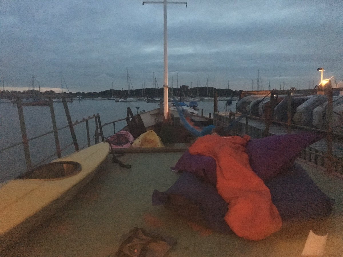 Two tired nephews sleeping on deck of our boat for the first time for #wildnightout