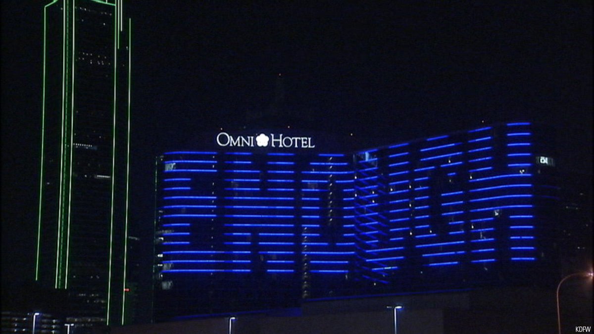 FoxNews's tweet image. The #OmniHotel in #Dallas displayed “ENOUGH” in blue lights after the police shooting in #BatonRouge.