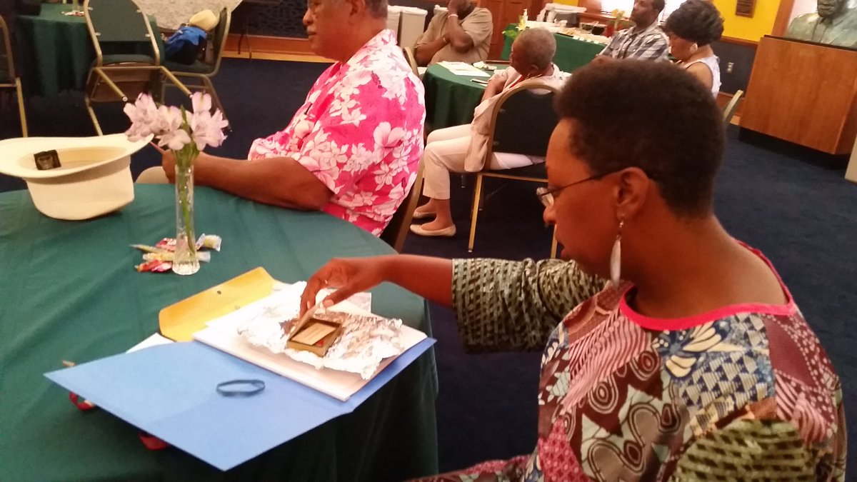 Taking a closer look at a surprise museum donation on Saturday at the MRSPT event.