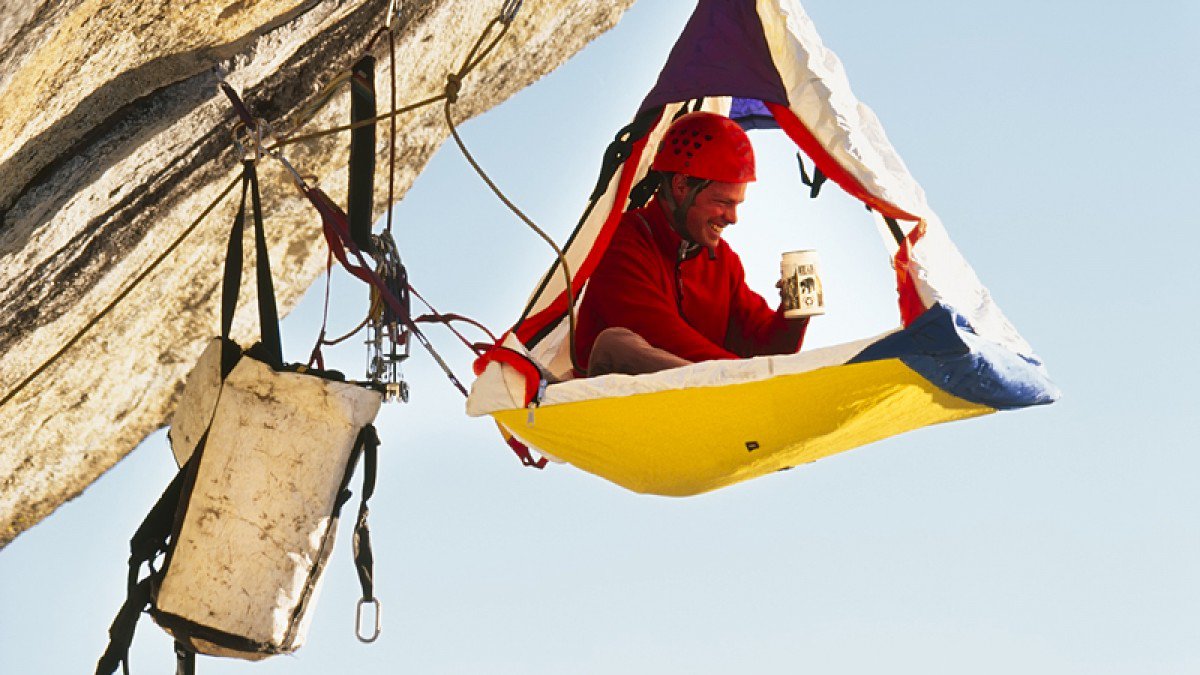 outsidemagazine's tweet photo. You don't have to be Tommy Caldwell in a Jimmy Chin shoot to try portaledge camping: https://t.co/6dqJyjGhNu https://t.co/BPSrctKF28