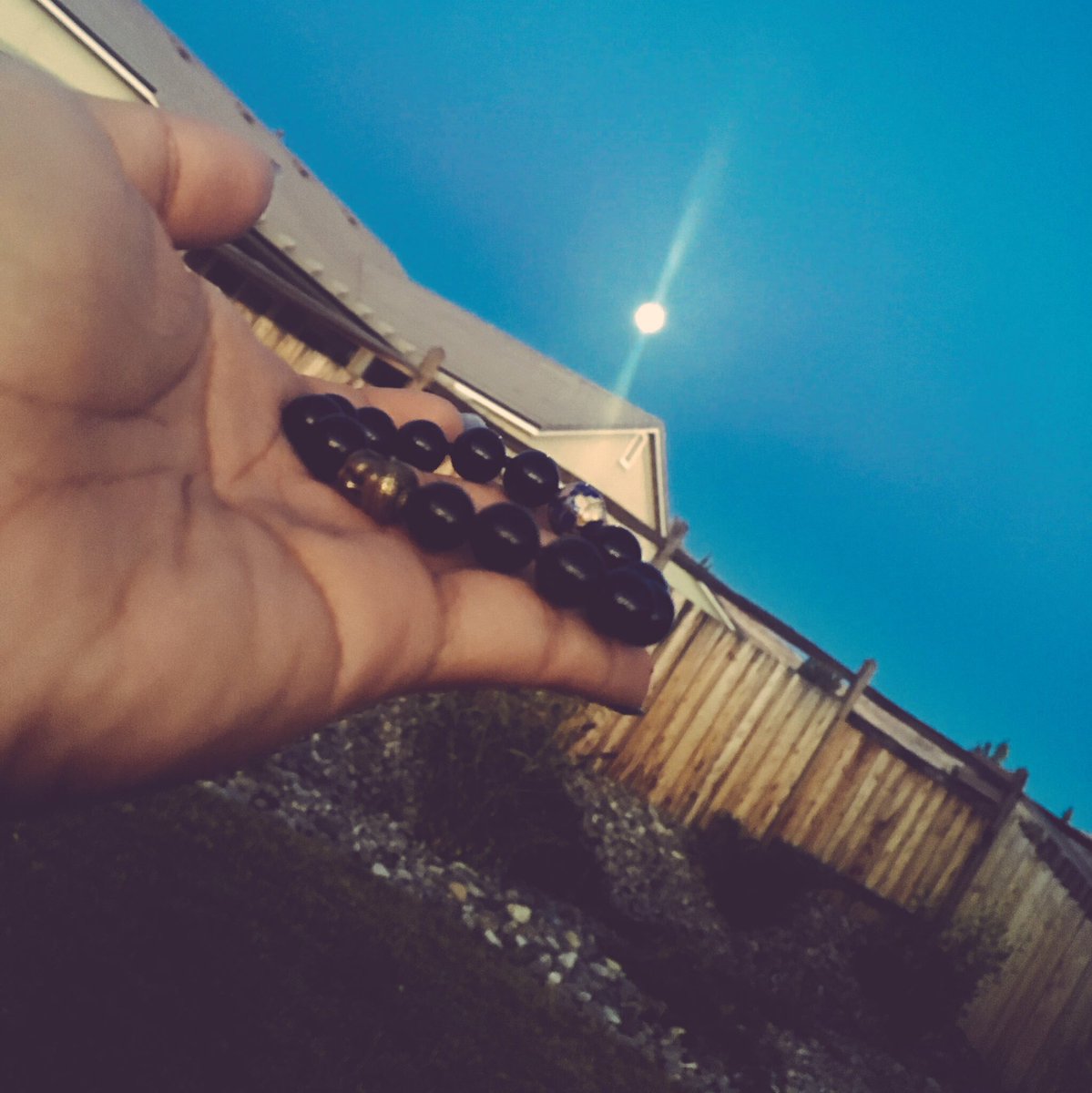 DearJessicaAnn's tweet photo. It's a full moon tonight! Time to charge my bracelet.🌕✨ #DistanceAndTime https://t.co/Ob5iSe2H9x