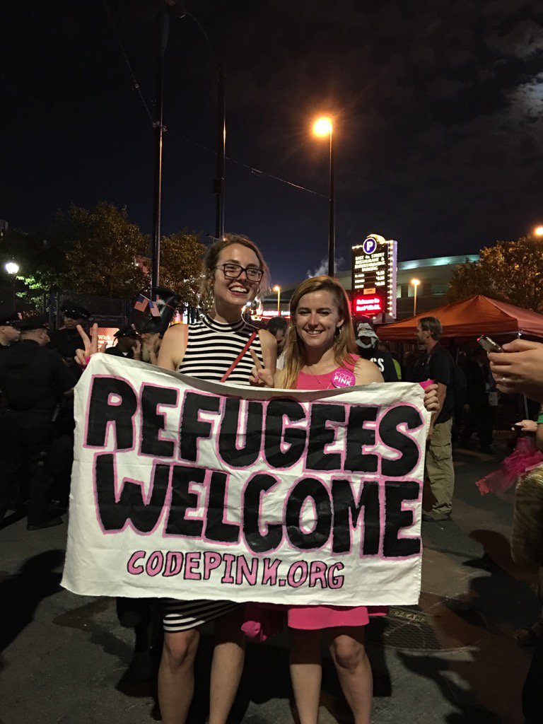 codepink's tweet image. Our amazing #RNCinCLE disrupters, Chelsea Byers and Alli McCracken, outside the arena at #RNC2016! You go!!
