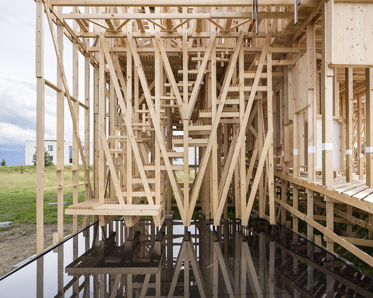 WACommunity's tweet photo. ALICE installs a fully-fledged timber framework House 1 at EPFL campus in Lausanne: https://t.co/thtmkkiWhr #art https://t.co/SSzvMFdmvD