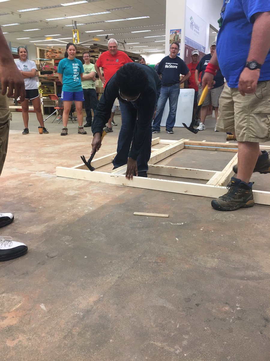 HabitatWake's tweet photo. Our longest standing employee, Brenda (16 years), hammers in the first nail of the day! #TogetherWeBuild https://t.co/Oy6HC1OJgx