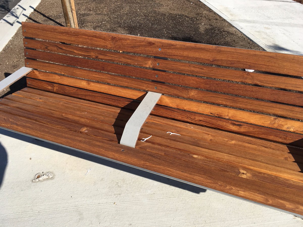 benchesofissy's tweet image. New one by the Atlas development on Gilman. Apparently a good place to floss your teeth. Might become a bus stop?