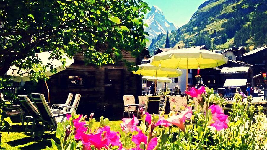 HotelParnass's tweet photo. #view from #hotelparnass #garden is not bad 😉  🌸 #sun #comfy #chairs #matterhorn #drinks are waiting 😄  #zermatt https://t.co/EY9LwXYiFk