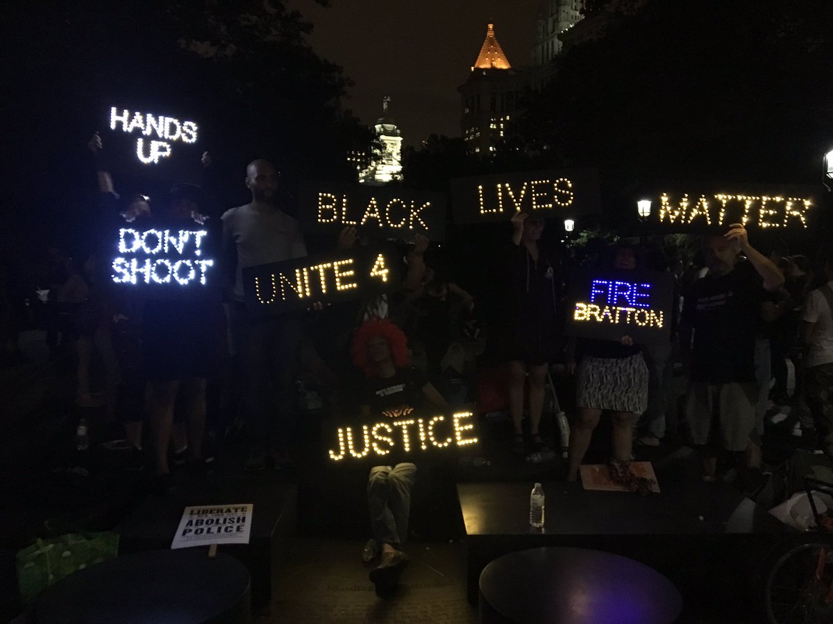 MillionsMarch's tweet photo. #ShutdownCityHallNYC holding space into the night. We out here!! #FireBratton #AbolishPolice https://t.co/dRfwRBpj6p