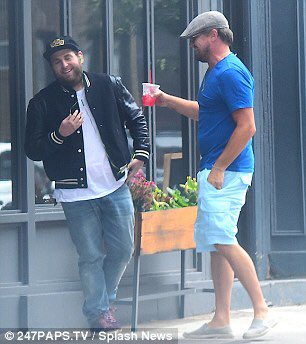 Leonardo DiCaprio running up to Jonah Hill and pretending to be a fan taking pictures (2016)