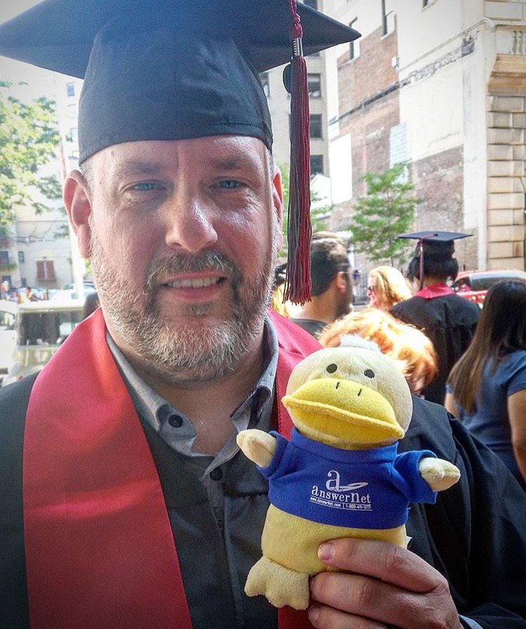 AnswerNet's tweet photo. Don Legg, a National Sales Executive at AnswerNet, brought @PatThePhatDuck to his #graduation! Congratulations, Don! https://t.co/StxqN1M2RL