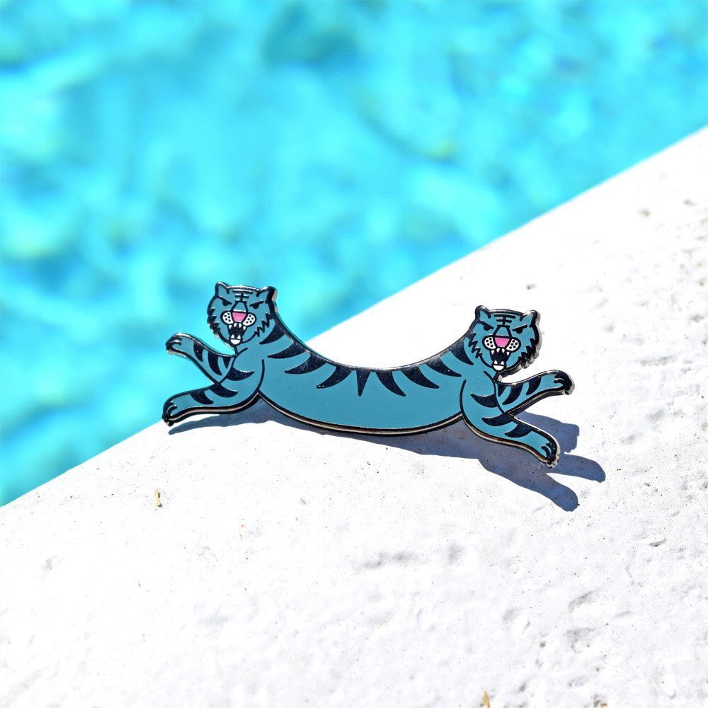 NoFitStateCo's tweet photo. Siamese Tiger pin by Valley Cruise Press now stocked at https://t.co/33q6kB2kfk https://t.co/nsgsy5SNjd