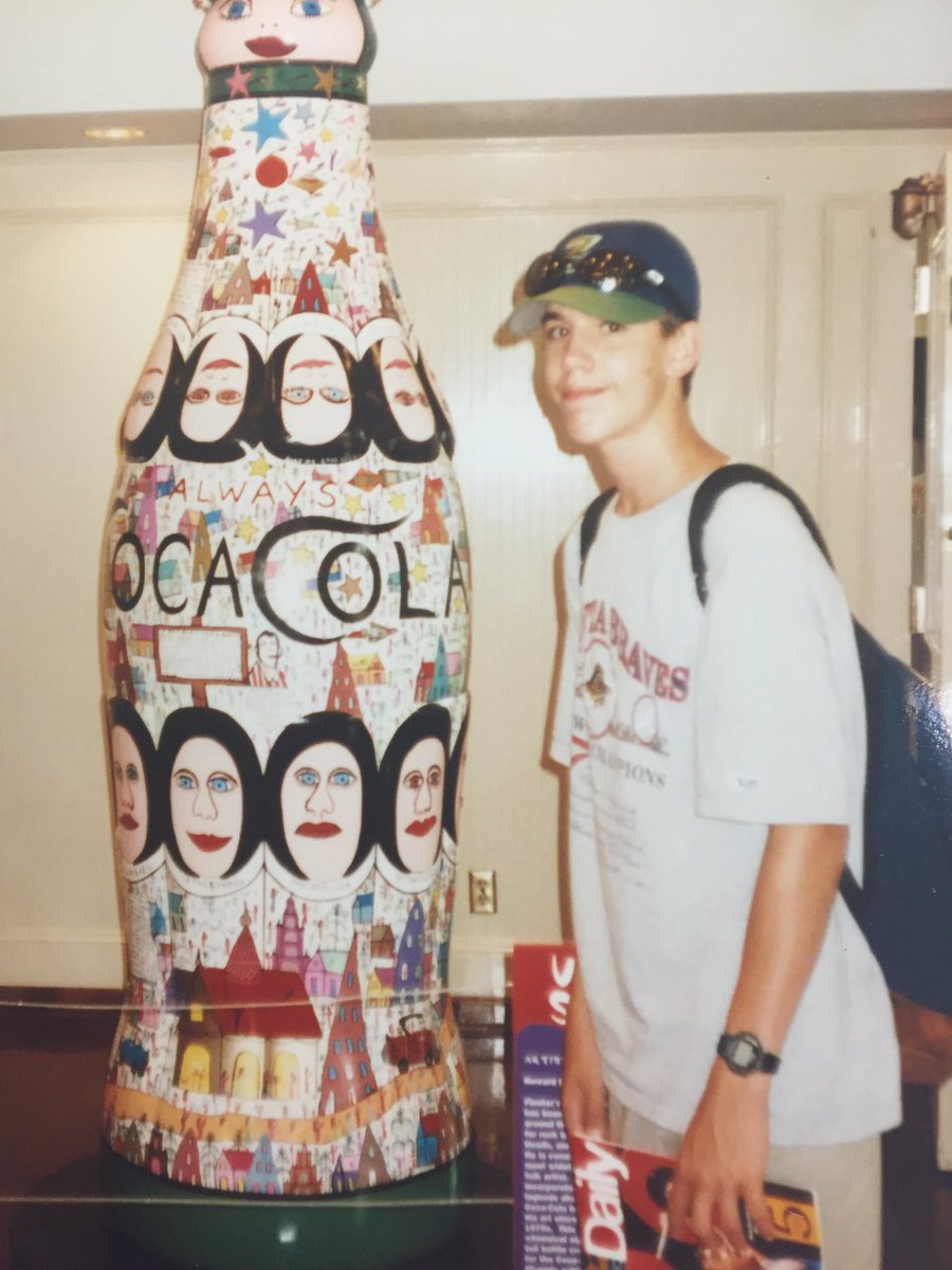 BradFrilot's tweet photo. My @Braves World Series champs shirt in 96 &amp; at HOF induction for Cox, Maddux, and Glavine #ThrowbackBraves https://t.co/CTaiBppiAx