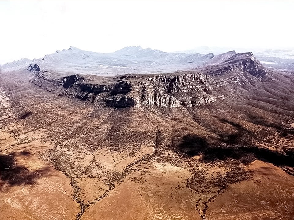 AnnQld1's tweet photo. Wilpena Pound, in the Flinders ranges, South Australia. An impressive sight yet it rarely receives a mention.  🔊 https://t.co/4ofd6R9qLS