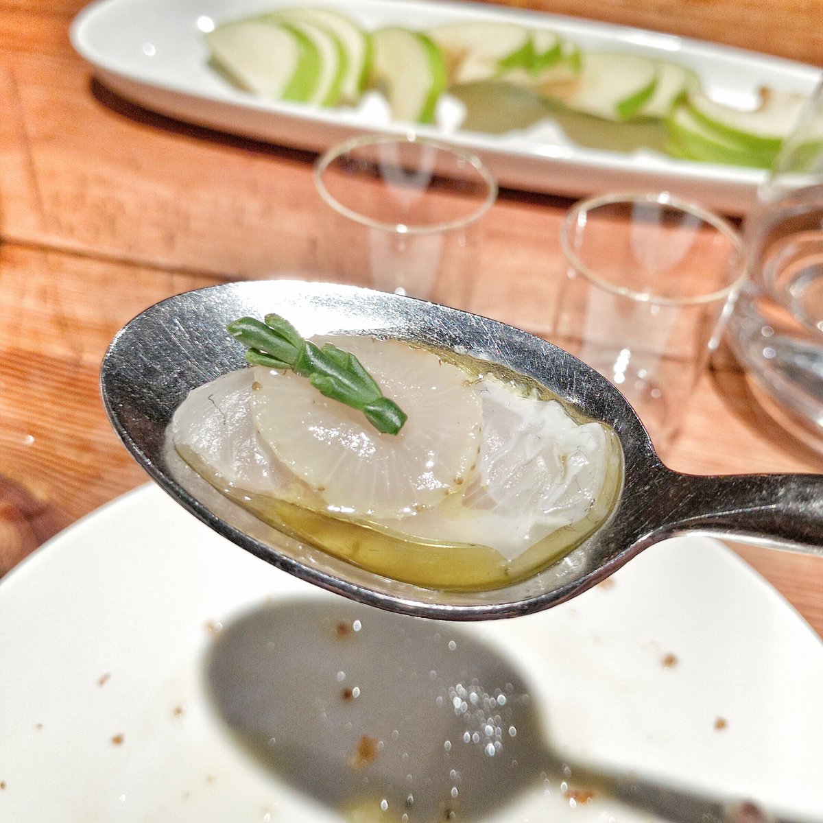 Raw sea bream with olive oil at Buca in Toronto, Ontario