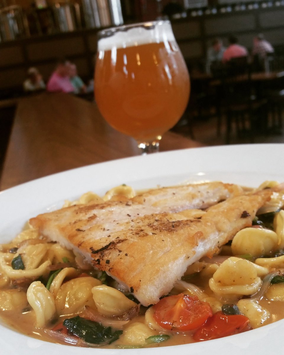 Lake Victoria Perch, wilted spinach, heirloom tomatoes, orecchiette pasta and lemon butter.. Great with 64-bit Wit!