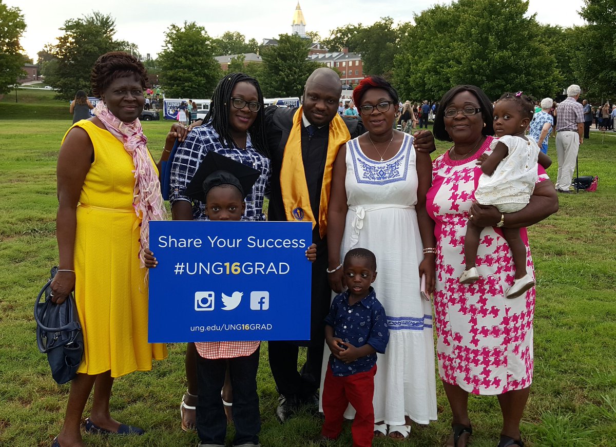 uofnorthgeorgia's tweet photo. A happy family congratulates their graduate. #UNG16grad https://t.co/RceEvSiTPR