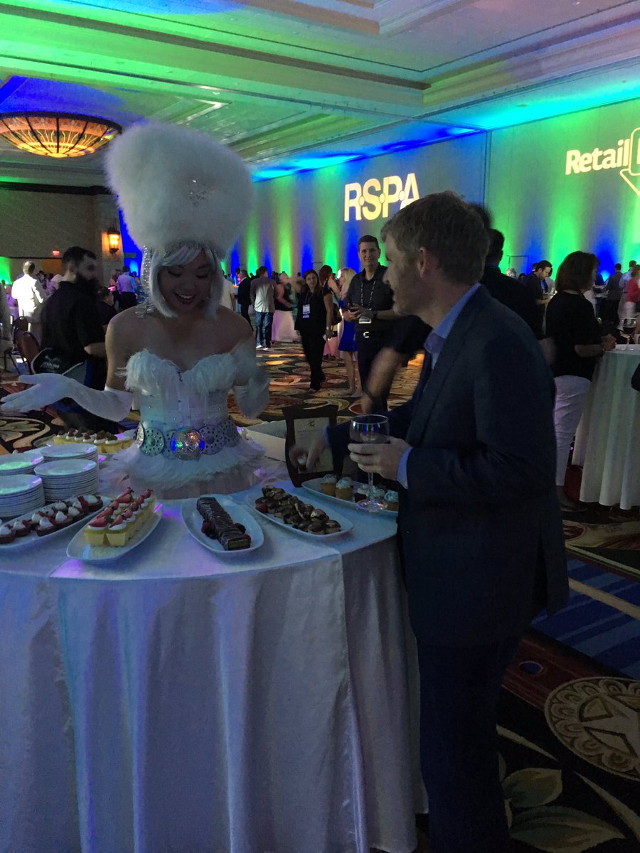 lstafford625's tweet photo. Funniest thing I have seen at #RetailNOW2016 @Vantiv @InsideRSPA woman with skirt tables. Matt Taylor was laughing https://t.co/pNnAw9QTeD