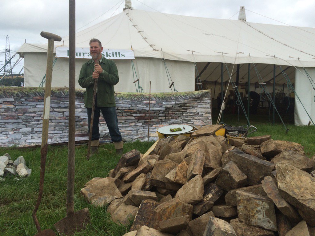 kirknorthdevon's tweet photo. Outside the rural skills tent at the #NDshow ... That's Tim and he builds dry stone walls ... more @BBCDevon https://t.co/ny6expFl79