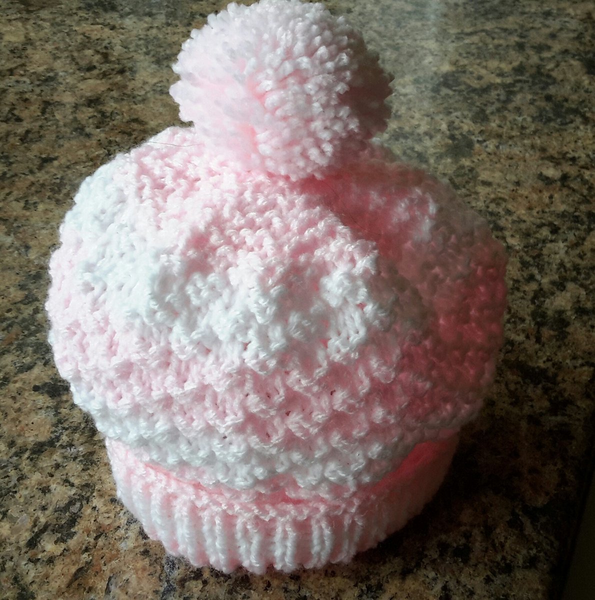 Baby hats made to order to your requirements. 
Here's an example of one I've just finished. From £3 each, can post.