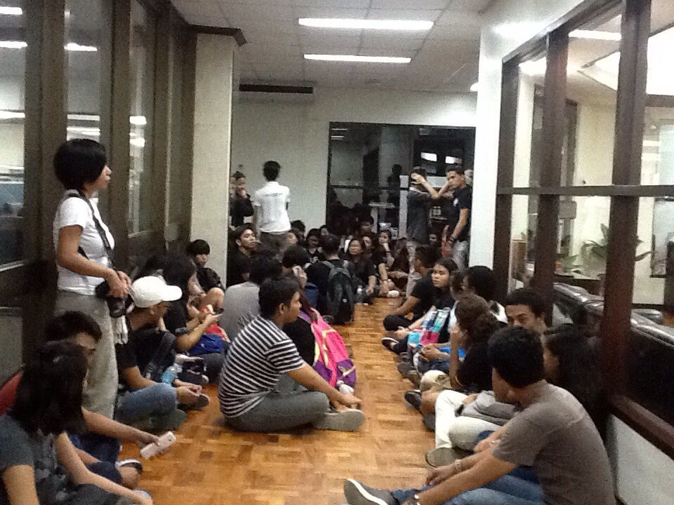 Students occupy the third floor of the Main Library; hold a program to register their calls. #JunkSAIS