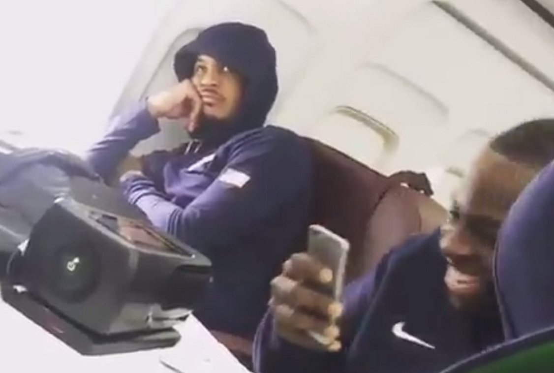 Zoo_Keys_'s tweet photo. Musical Angst Level: 'Melo on the #TeamUSA plane. This is my face every time I see somebody post about Hollystock. https://t.co/3Xm8iXIHnY