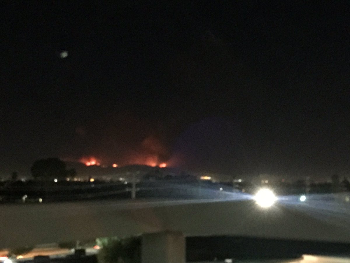 SteamerSteamer's tweet photo. These pix from Warner Center don't do it justice. Some of the flames are straight red. #SandFire https://t.co/bT52RN8g3Q