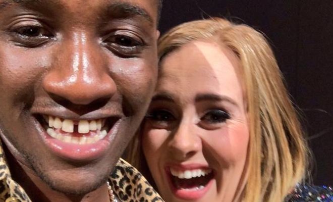Orzdboss's tweet photo. Sharp Nigerian Guy Kisses Adele on stage https://t.co/AcP49Wioym https://t.co/r6rOpUAhOy