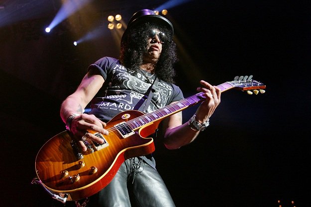 CRAVE_Guitars's tweet photo. A Very Happy Birthday to British/American guitarist Slash, 51 today (23 July). Best known as member of Guns N' Roses https://t.co/Ofix3RWfWC
