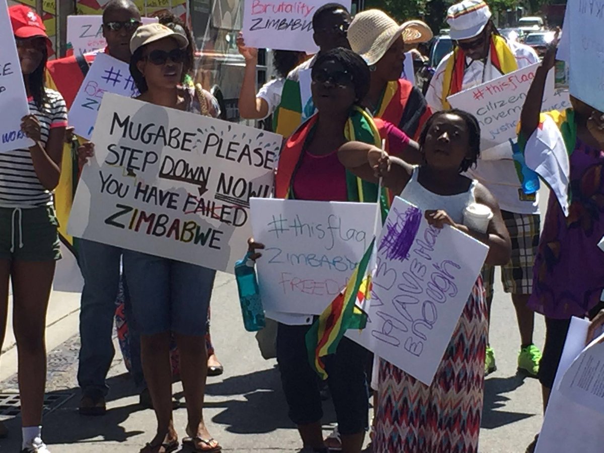 ACAWRA's tweet photo. Zimbabweans in #Kitchener - #Waterloo #Canada standing for peace and democracy #thisflag #tajamuka #sesikile #NOMORE https://t.co/rlX9u1oP2f