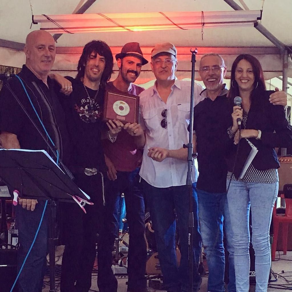 FlowersCircle's tweet photo. Award ceremony for the 50th anniversary of @alfiomusicsardegna 's music career #itsonlyroc… https://t.co/e0ZA2IcjRF https://t.co/1rXt8scLNe